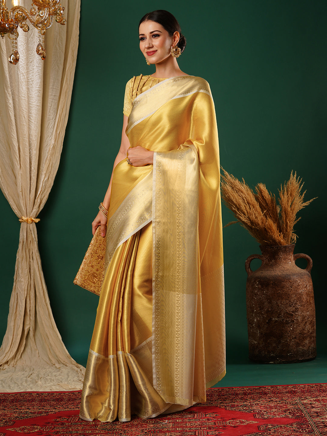 Women's Handloom Banarasi Solid gold saree with broad Zari Border