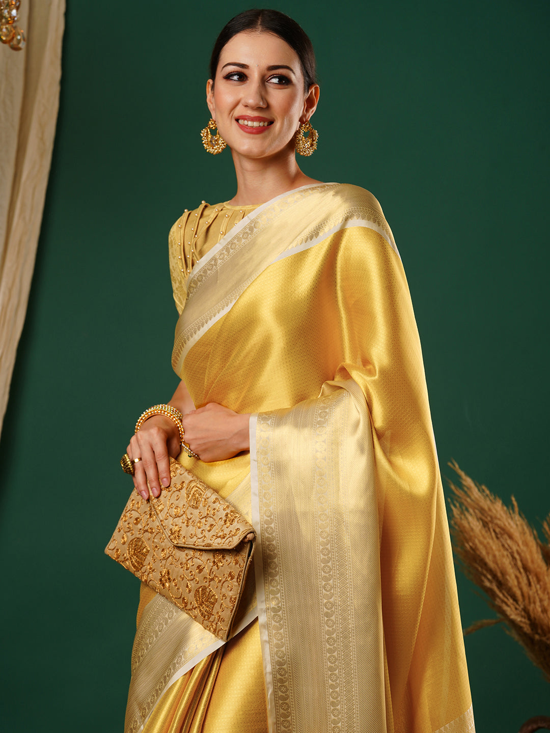 Women's Handloom Banarasi Solid gold saree with broad Zari Border