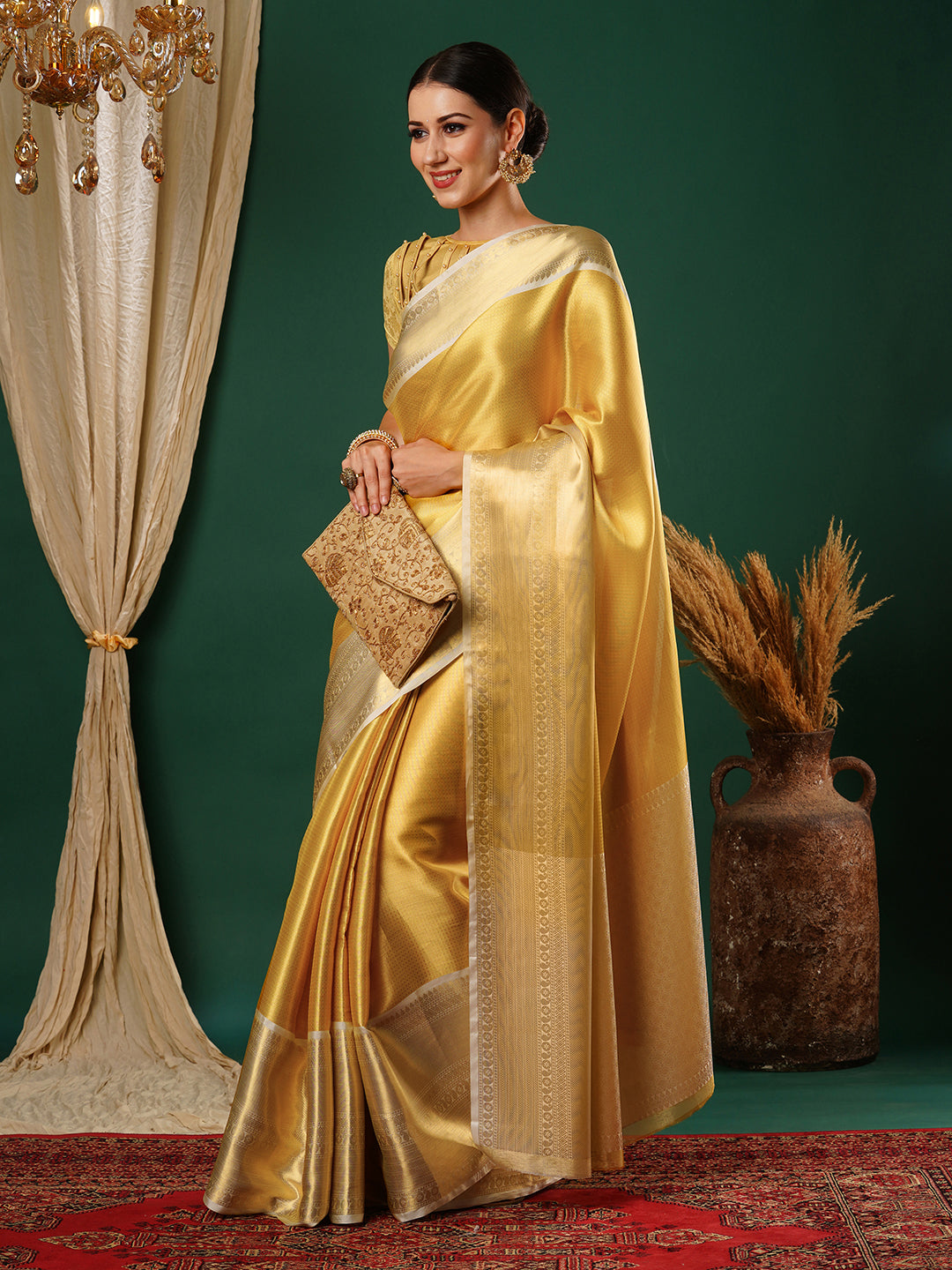 Women's Handloom Banarasi Solid gold saree with broad Zari Border