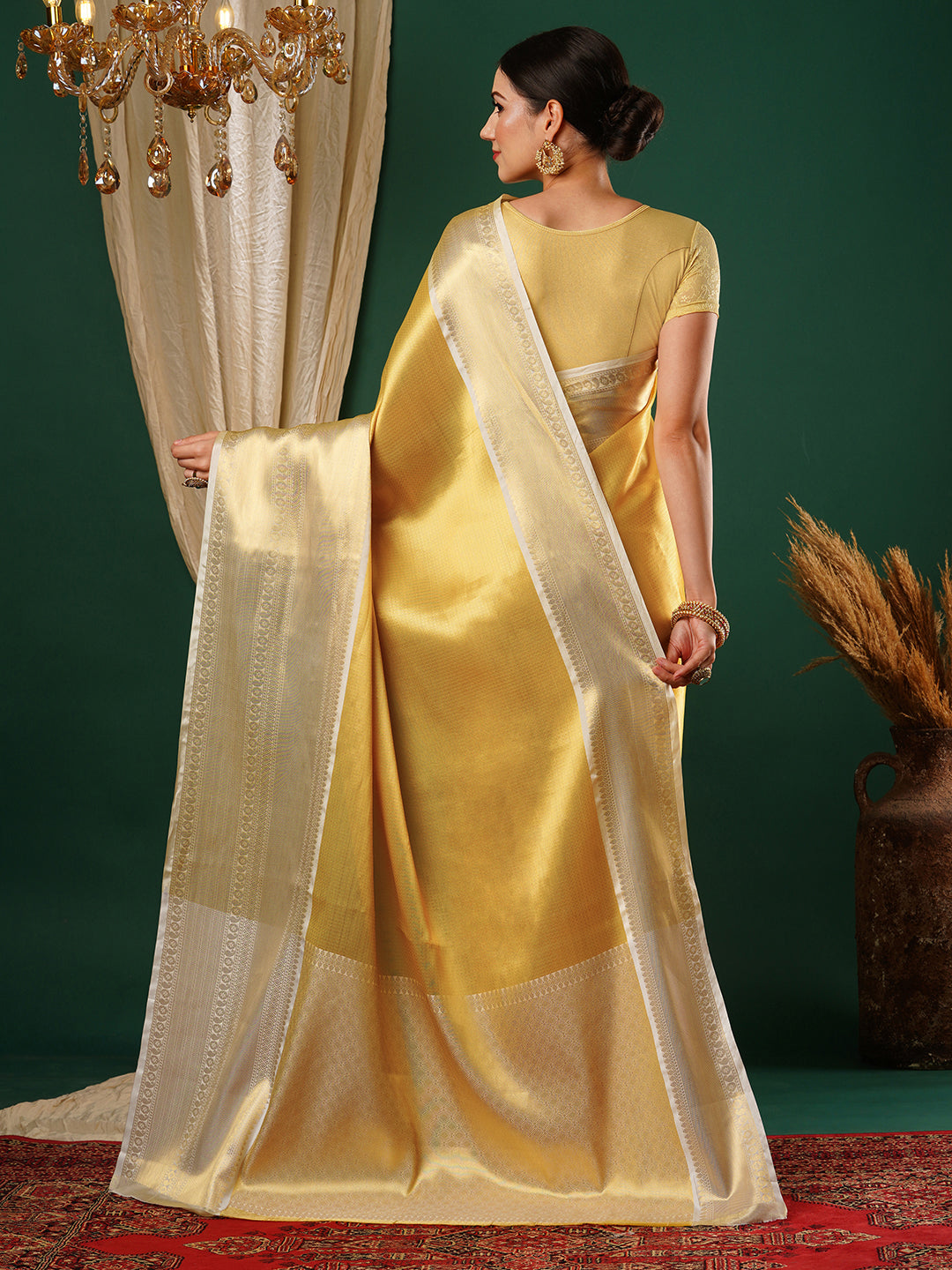 Women's Handloom Banarasi Solid gold saree with broad Zari Border
